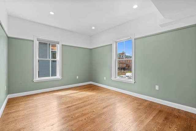 63 Perrin St, Boston, MA 02119 - unfurnished room featuring wood finished floors, baseboards, and recessed lighting