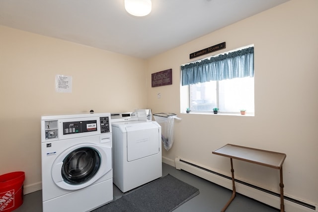 laundry room featuring separate washer and dryer and a baseboard radiator