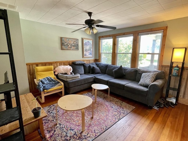 98 Everett St Unit 98, Easthampton, MA 01027 - living area featuring wainscoting, hardwood / wood-style flooring, ceiling fan, and wooden walls