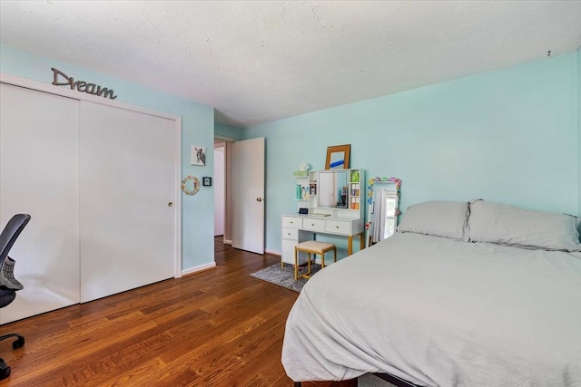 17 York Towne Ter Unit 17, Holden, MA 01520 - bedroom featuring wood finished floors, a closet, and baseboards