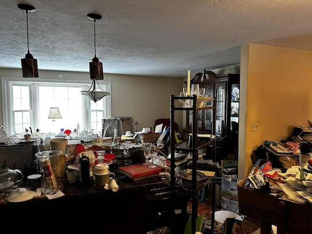 dining room with a textured ceiling