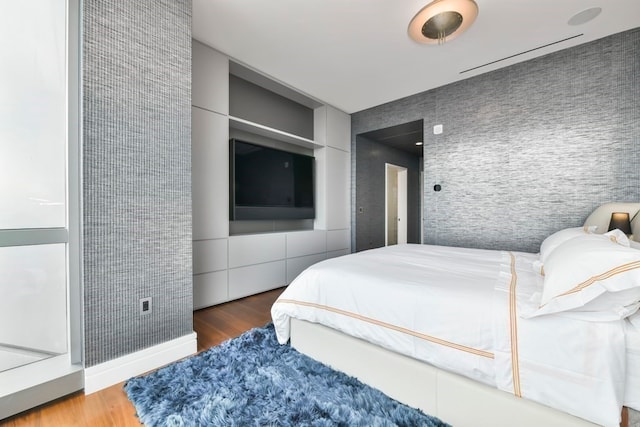 bedroom featuring hardwood / wood-style floors