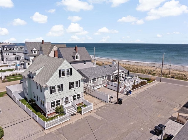 bird's eye view with a view of the beach and a water view