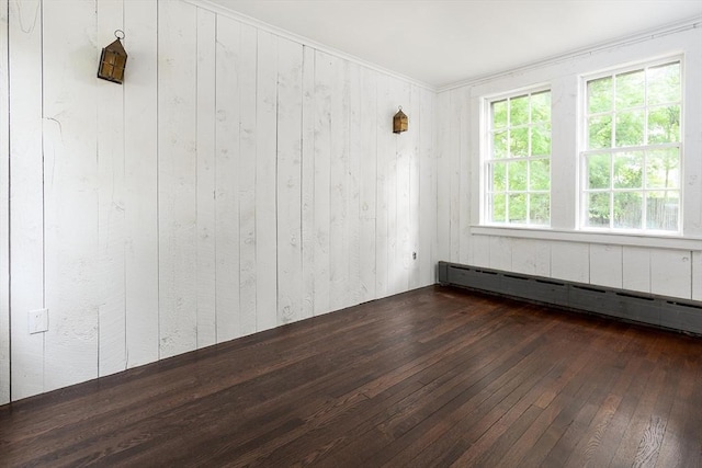 10 Ravenna Rd, Boston, MA 02132 - spare room with baseboard heating, dark wood finished floors, and wooden walls