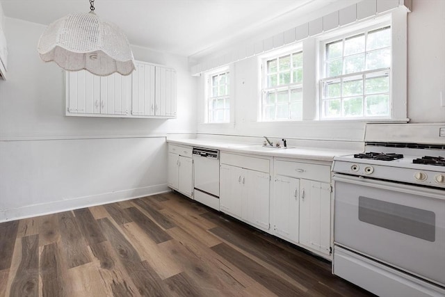 10 Ravenna Rd, Boston, MA 02132 - kitchen with white appliances, white cabinets, dark wood-style floors, light countertops, and pendant lighting