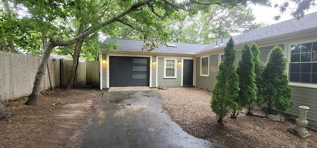 68 Bob-O-Link, Yarmouth, MA 02673 - property entrance with asphalt driveway and an attached garage