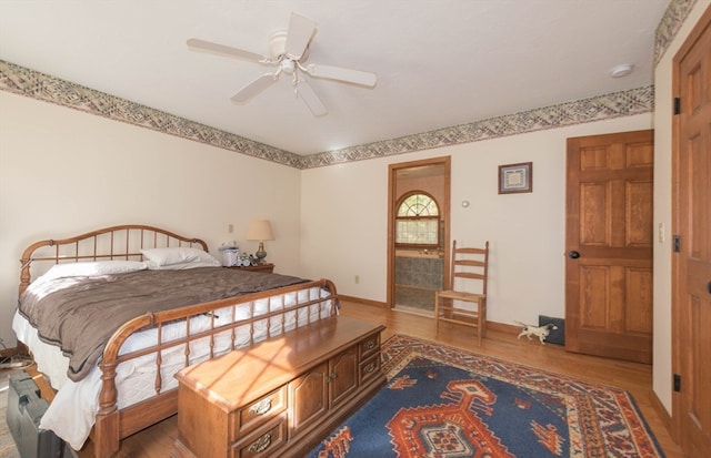 bedroom featuring ceiling fan and light hardwood / wood-style flooring