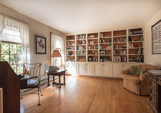 living area with light hardwood / wood-style floors