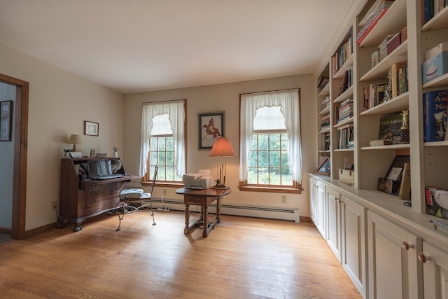 office featuring baseboard heating and light hardwood / wood-style floors