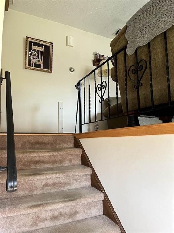 stairs featuring visible vents