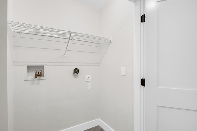 laundry area featuring hookup for a washing machine and hookup for an electric dryer