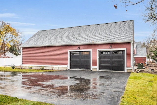 garage featuring central AC unit