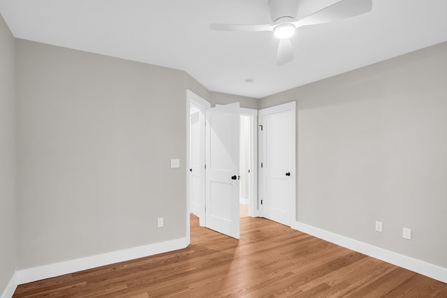 interior space featuring light wood-type flooring and ceiling fan