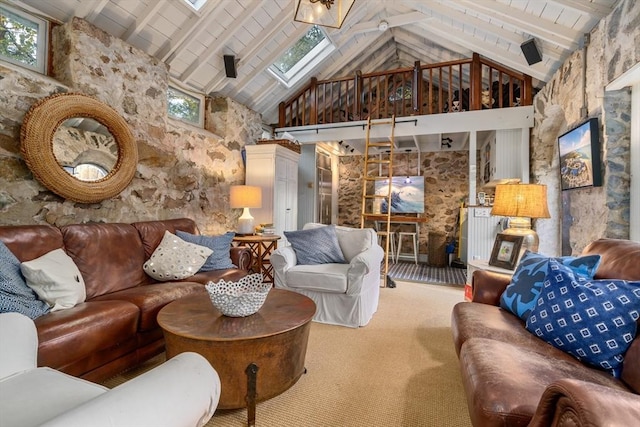 living area with a skylight, high vaulted ceiling, and carpet