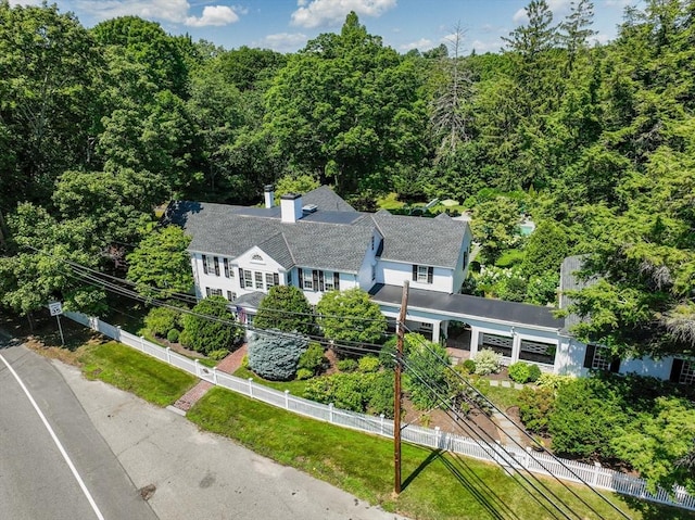 aerial view featuring a view of trees