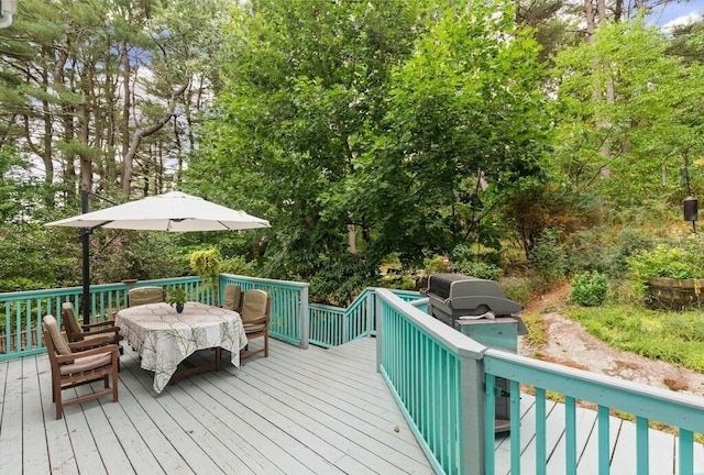 90 Southern Ave Unit 90, Essex, MA 01929 - wooden terrace featuring outdoor dining area and area for grilling