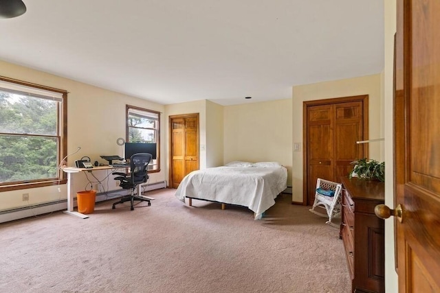 90 Southern Ave Unit 90, Essex, MA 01929 - bedroom with light colored carpet, a desk, and a baseboard radiator