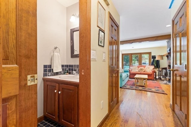 90 Southern Ave Unit 90, Essex, MA 01929 - hall with french doors, wood finished floors, and a sink