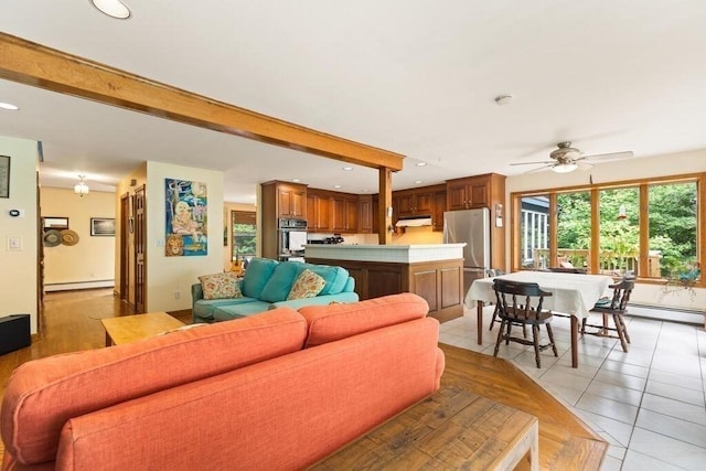 90 Southern Ave Unit 90, Essex, MA 01929 - living area featuring a baseboard heating unit, recessed lighting, ceiling fan, and light tile patterned floors