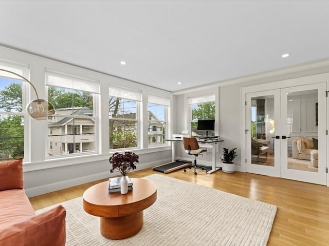 39 Paul St, Watertown, MA 02472 - living area featuring french doors, a desk, wood finished floors, and recessed lighting