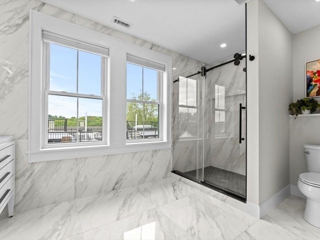 39 Paul St, Watertown, MA 02472 - bathroom featuring toilet, a marble finish shower, marble finish flooring, vanity, and recessed lighting