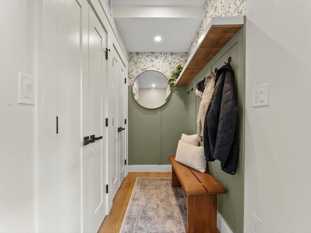39 Paul St, Watertown, MA 02472 - mudroom featuring light wood finished floors, baseboards, and recessed lighting