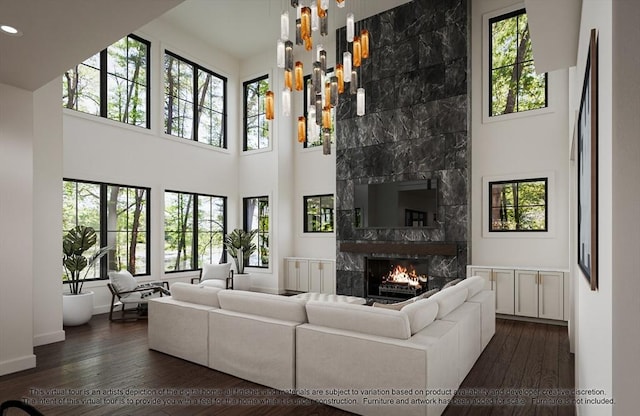 LOT3 Ridge Rd, Northborough, MA 01532 - living area featuring dark wood-style floors, a fireplace, recessed lighting, a towering ceiling, and baseboards