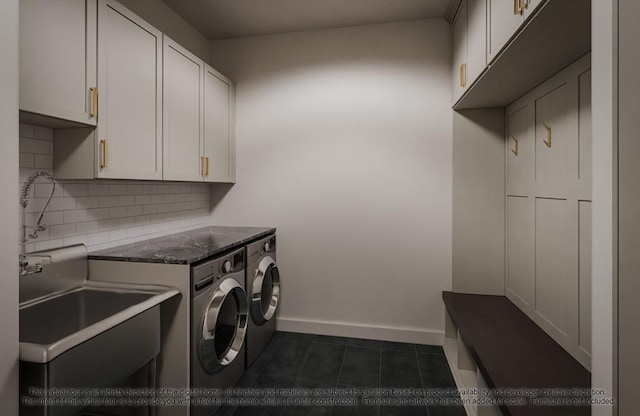 LOT3 Ridge Rd, Northborough, MA 01532 - laundry room featuring washer and dryer, cabinet space, baseboards, and dark tile patterned floors