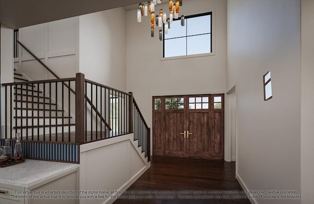 LOT3 Ridge Rd, Northborough, MA 01532 - foyer entrance with dark wood finished floors, a chandelier, plenty of natural light, a high ceiling, and stairs