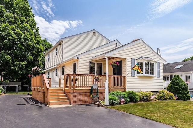 32 Cambo St, Brockton, MA 02301 - view of front of house with a gate, a deck, and covered porch