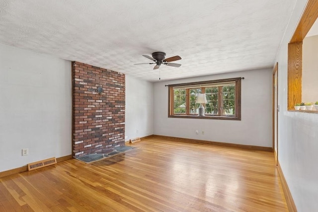 32 Cambo St, Brockton, MA 02301 - spare room with ceiling fan, light wood-type flooring, and a textured ceiling