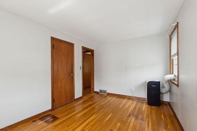 32 Cambo St, Brockton, MA 02301 - unfurnished room with light wood finished floors and baseboards