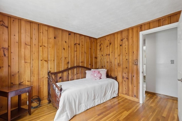 32 Cambo St, Brockton, MA 02301 - bedroom featuring light wood-style flooring and wood walls