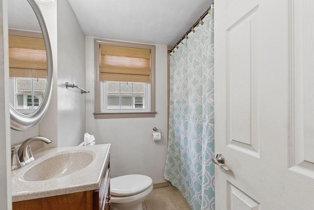32 Cambo St, Brockton, MA 02301 - full bathroom featuring vanity, plenty of natural light, tile patterned floors, and a shower with shower curtain