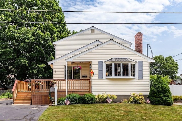 32 Cambo St, Brockton, MA 02301 - bungalow with a chimney and a deck