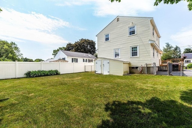 32 Cambo St, Brockton, MA 02301 - back of property featuring a shed and a fenced backyard