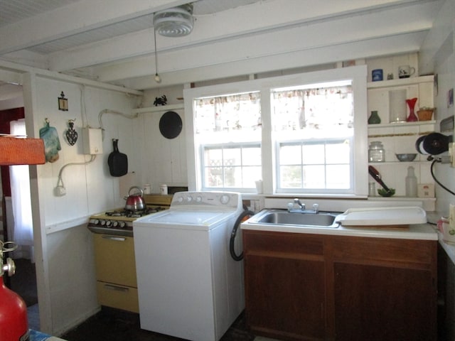 laundry room with sink and washer / clothes dryer