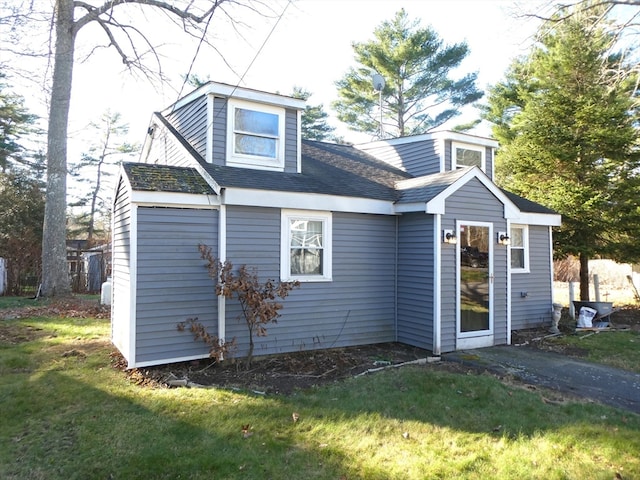 exterior space with a front yard