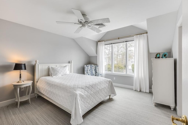 bedroom with carpet, visible vents, a ceiling fan, vaulted ceiling, and baseboards