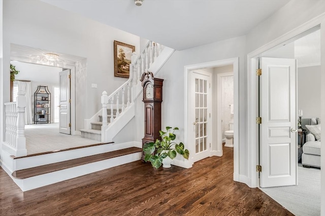 interior space with stairway and wood finished floors