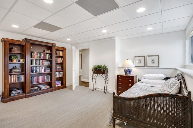 bedroom with carpet floors, baseboards, a drop ceiling, and recessed lighting