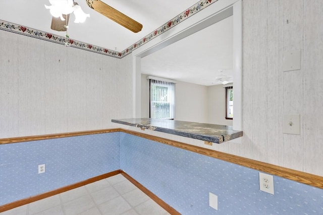 49 Bamforth Rd, Springfield, MA 01128 - kitchen with a ceiling fan and tile patterned floors