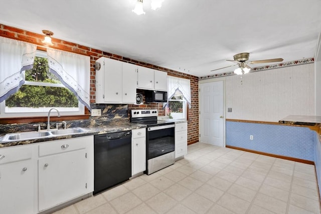 49 Bamforth Rd, Springfield, MA 01128 - kitchen featuring black appliances, dark countertops, white cabinets, plenty of natural light, and wallpapered walls