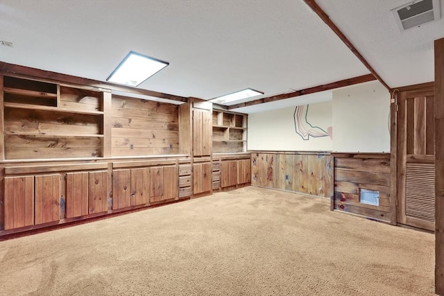 49 Bamforth Rd, Springfield, MA 01128 - basement with light colored carpet, wood walls, and a wainscoted wall