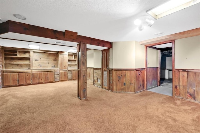 49 Bamforth Rd, Springfield, MA 01128 - finished basement featuring carpet floors, a wainscoted wall, a textured ceiling, and wood walls
