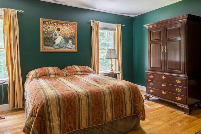 bedroom featuring light hardwood / wood-style floors