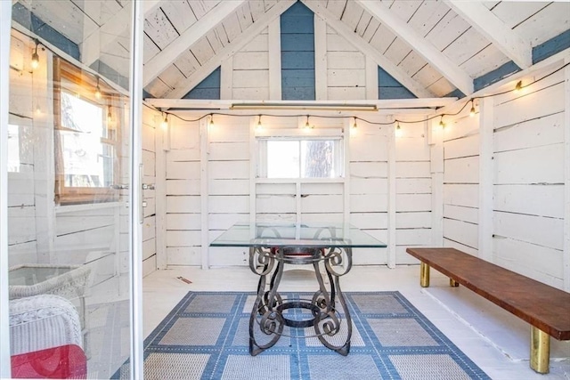 below grade area with wood ceiling and wood walls