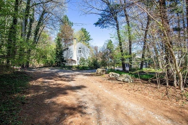 view of road featuring driveway