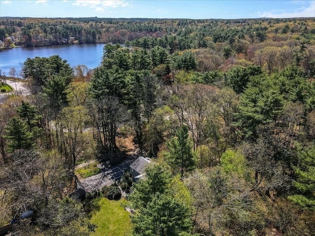 aerial view featuring a water view and a wooded view