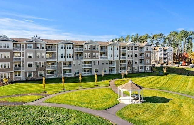 320 Martins Lndg Unit 307, North Reading, MA 01864 - view of property's community featuring a gazebo and a lawn